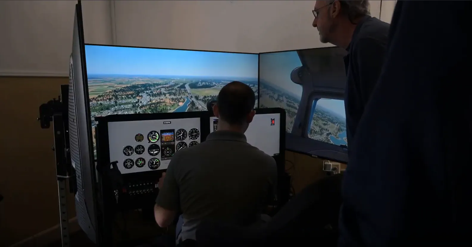 Instructor and student working an engine failure scenario in the simulator