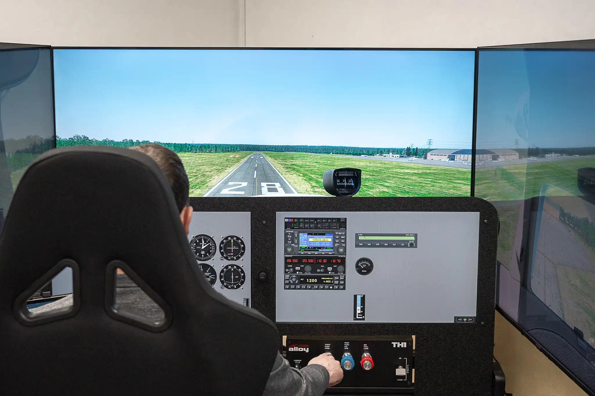 Student flying a simulator lesson on a weather day at Solid Ground Aviation