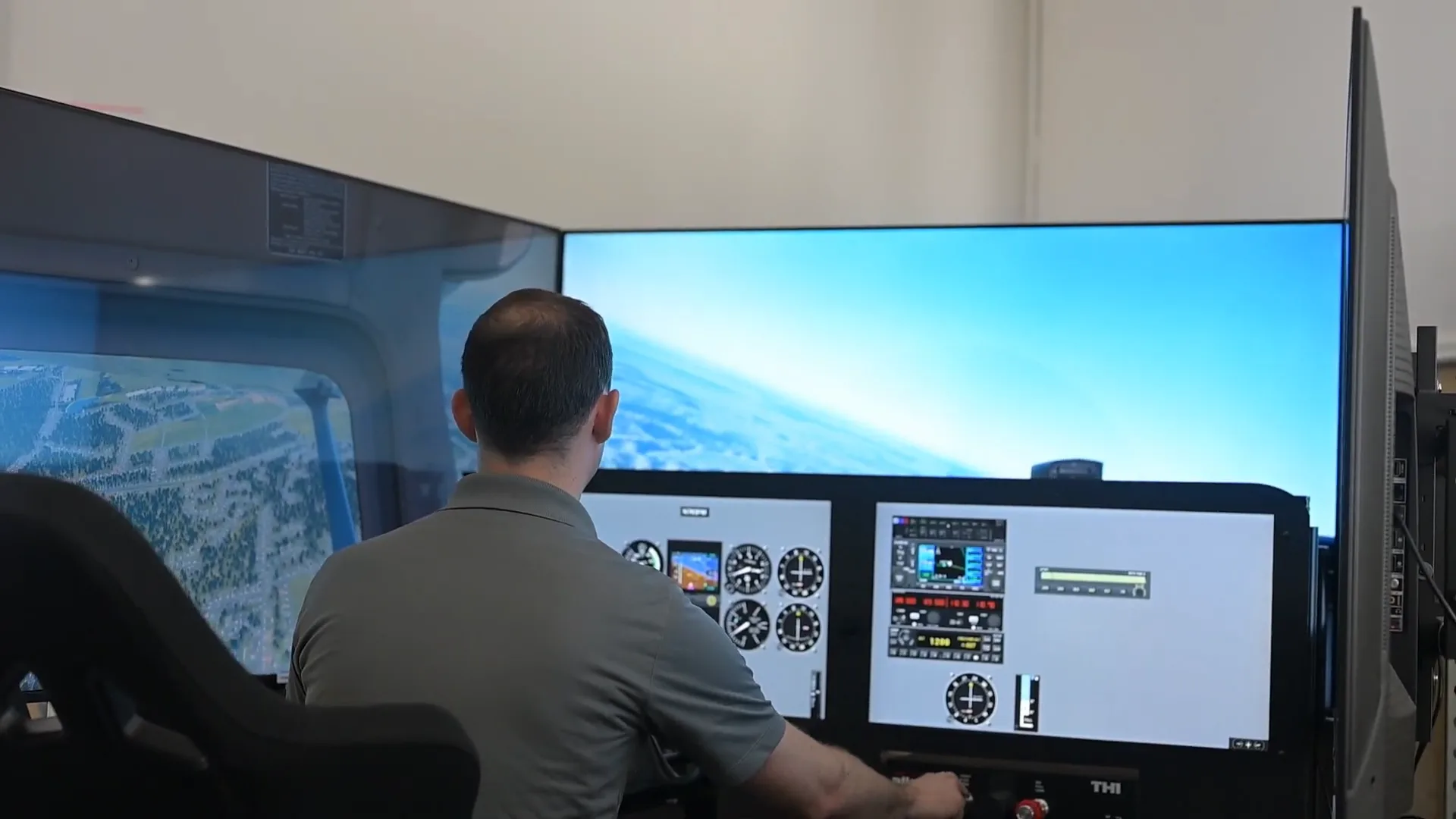 Student pilot flying an instrument approach in the SG-2 simulator